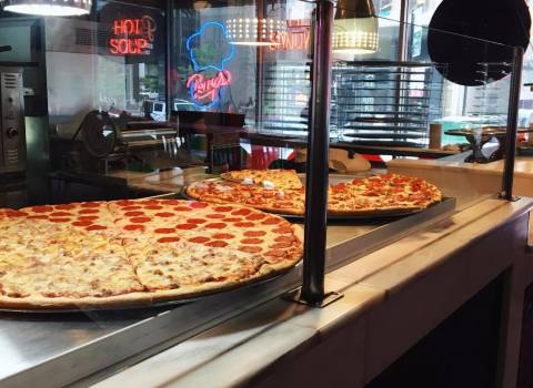 The Gigantic Pizza Served At Bacci Pizzeria In Illinois Is Almost As Big As The Table