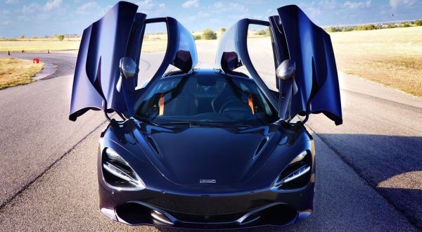 Zoom Around A Racetrack In A Luxury Sports Car At Motor Sports Ranch In Texas