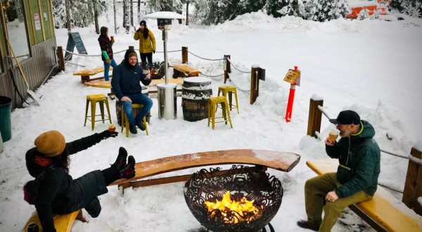 Cozy Up Around The Fire In Girdwood Brewing Company’s Beer Garden This Winter In Alaska