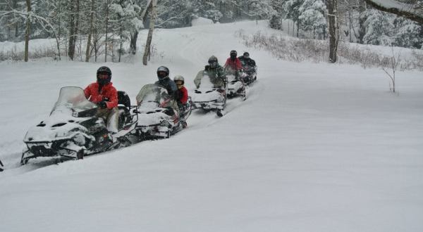 Take This Exhilarating Snowmobile Tour Through New York’s Adirondacks For The Ride Of A Lifetime