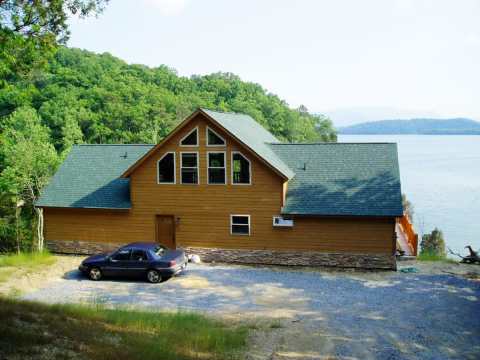 Forget The Resorts, Rent This Charming Waterfront Cabin In Tennessee Instead