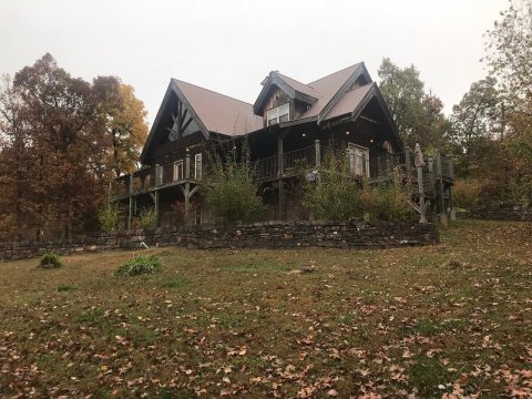 See The Waterfall And Stay In Cabins At Arkansas' Azalea Falls Lodge