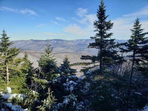 Hike Or Snowshoe New York's Giant Ledge And Panther Mountain Trail For Some Truly Stunning Views