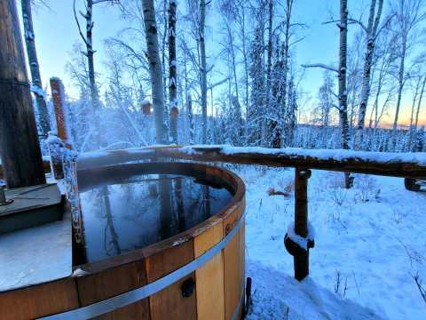Watch The Northern Lights From This Wood Fired Cedar Hot Tub In Alaska