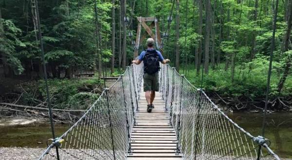 Cross A 90-Foot Swinging Bridge Over Big Creek At Girdled Road Reservation In Ohio