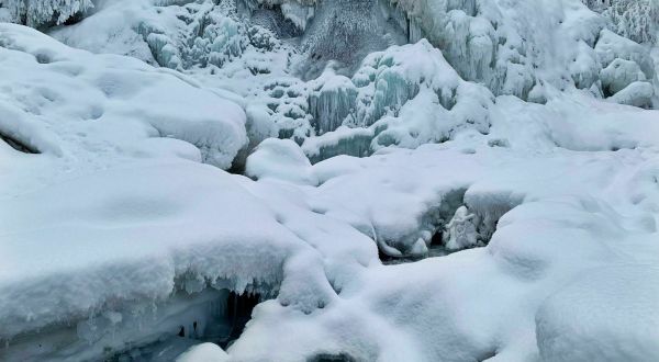 Travel Through A Winter Wonderland To Get To A Frozen Waterfall On The South Fork Falls Trail In Alaska