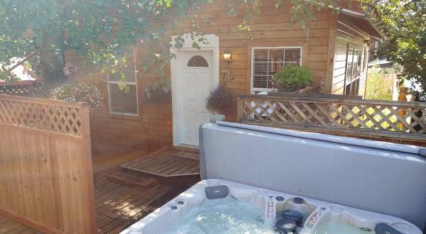 Soak In Your Private Hot Tub When You Spend The Night At This Cozy Cottage In Alaska