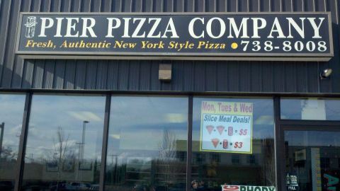 The Pizza At This Delicious Rhode Island Eatery Is Bigger Than The Table