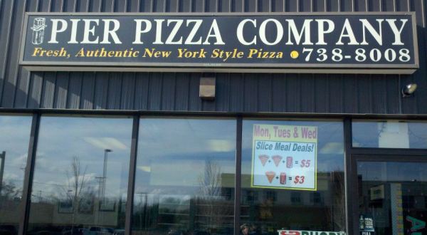 The Pizza At This Delicious Rhode Island Eatery Is Bigger Than The Table