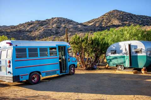 Book A Stay At This Converted Retro School Bus With A Pool In Southern California's Peaceful Desert