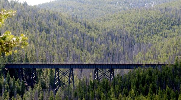 The One-Of-A-Kind Trail In Montana With Bridges And Railroad Tunnels Is Quite The Hike