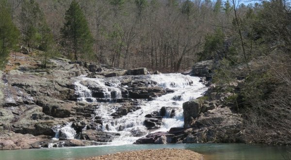 Swim Underneath A Waterfall At The Refreshing Rocky Falls In Missouri