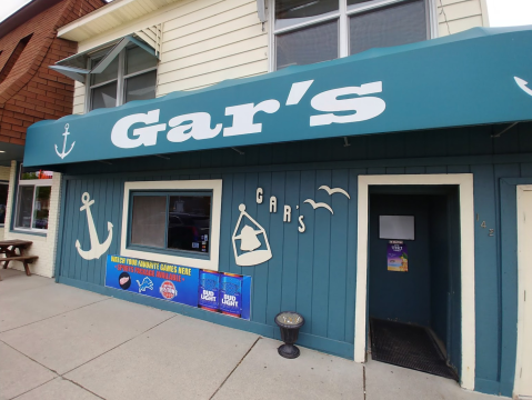 Treat Yourself To A Giant Burger, A Fishbowl Of Beer, And Free Popcorn At Gar's Lounge In Michigan
