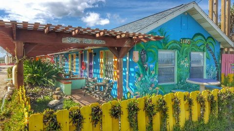 Spend The Night At This Colorful Beachside Bungalow, Si Como No Inn In Florida