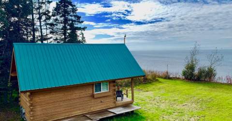 Stay High On A Bluff Above The Kenai River In This Cozy Alaskan Cabin