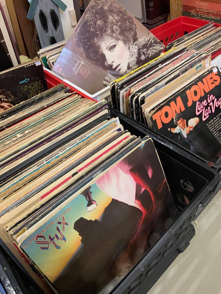 Antique shop in Georgia with black bins full of records.