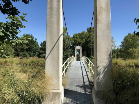 Walk Across A Picturesque Suspension Bridge On Picnic Island Loop Trail In Missouri