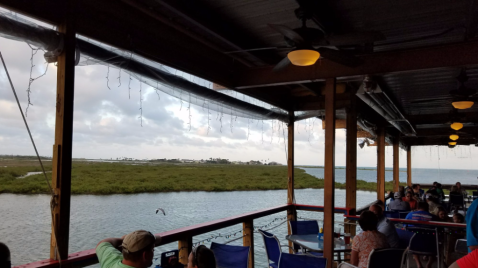 Pull Up In Your Boat And Enjoy A Waterfront Meal At Paradise Key Dockside Bar & Grill In Texas