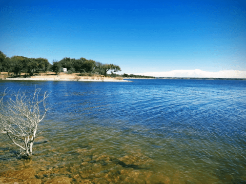 Texas' Lake Whitney Is An Underrated Summer Destination With 50-Foot Cliffs And Pristine Waters