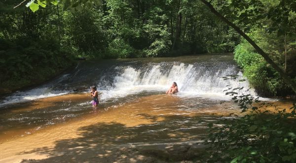 Hike Less Than Two Miles To This Spectacular Waterfall Swimming Hole In Wisconsin