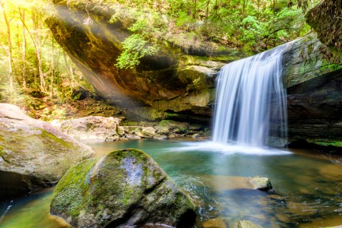 You’ll Want To Spend All Day At Dog Slaughter Falls, A Waterfall-Fed Pool In Kentucky