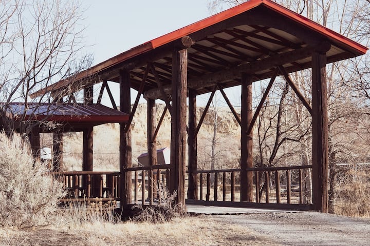 a covered bridge at Almosta Ranch Lodge in Wyoming