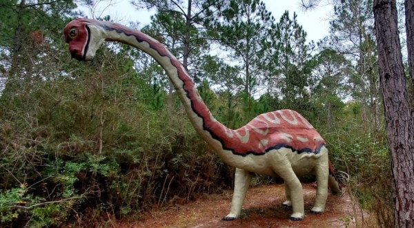 Discover Lifelike Dinosaurs Hiding In The Woods At This Alabama Marina