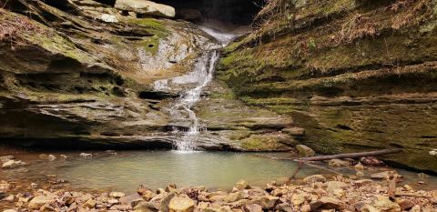 Hike Less Than A Mile To This Spectacular Waterfall Swimming Hole In Illinois