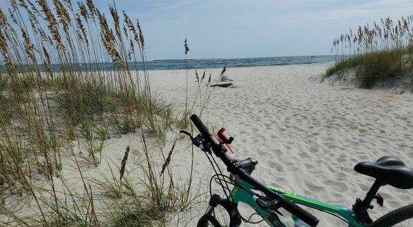 Walk Or Ride Alongside The Ocean On The 2.8-Mile Fort Macon Beach Trail In North Carolina