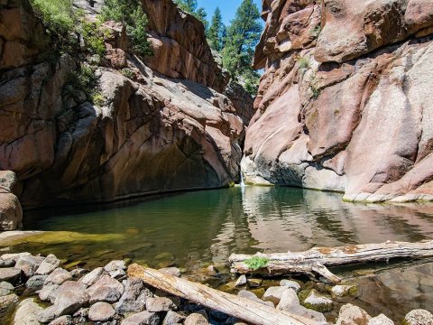 Hike Less Than One Mile To This Spectacular Waterfall Swimming Hole In Colorado