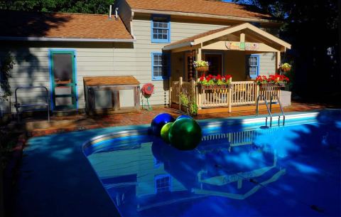 The Pool House Airbnb Has A Sauna, Pool, And Hot Tub For Ultimate Relaxation In Illinois