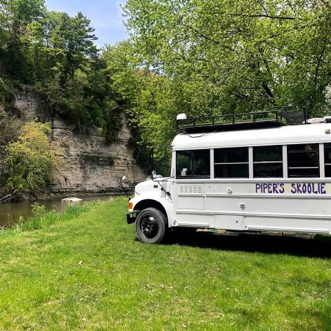 A Stay In A Repurposed School Bus On The Iowa River Offers a Unique Chance To Relax And Unwind