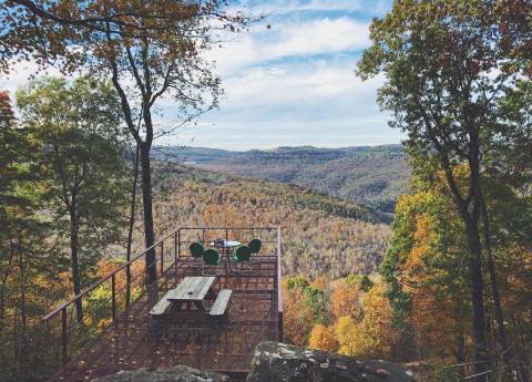 Featuring An Iron Deck That Stretches Over The Side Of A Mountain, Boulder Bluffs Cabins In Arkansas Offer An Exclusive View Of The Ozarks