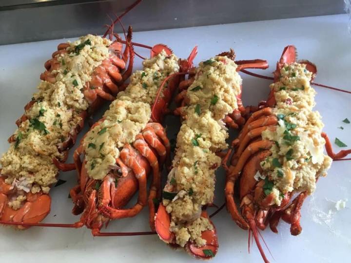 4 stuffed and baked lobsters with plenty of filling.