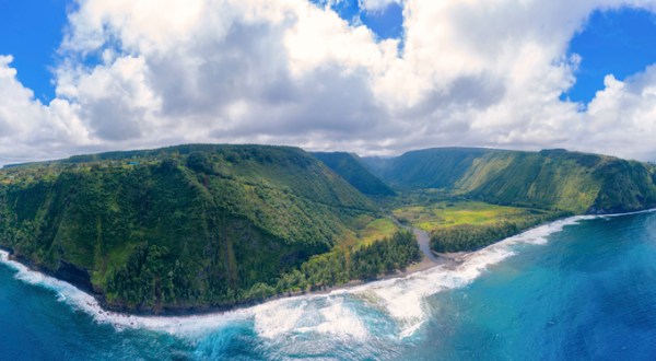 Visit Waipio Beach In Hawaii, A Hidden Gem Beach That Has Its Very Own Waterfall
