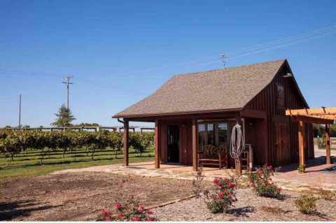 Stay At This Charming Cabin Located On A Vineyard For A Romantic Stay In Kansas