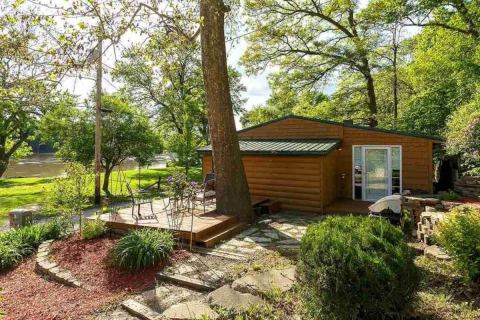 Book A Secluded Getaway At This Retro Riverside Cabin In Illinois