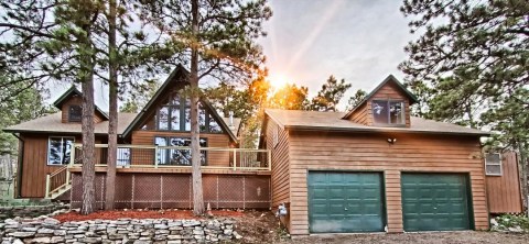 You'll Have A Front Row View Of The South Dakota Woods In This Cozy Cabin