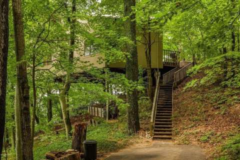 Sleep Among Towering Treetops At The Enchanted Lakefront Treehouse In Michigan