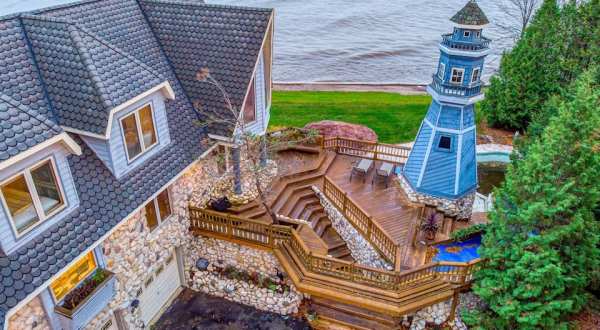 Enjoy Lakeside Luxury In A Vacation Home That Has Its Own Lighthouse