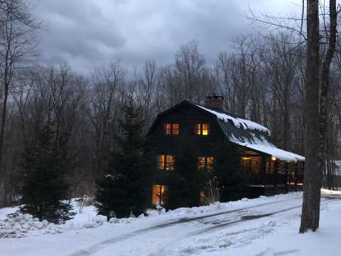 Watch Snow Fall From Your Cozy Cabin With A Hot Tub In Massachusetts' Scenic Berkshires