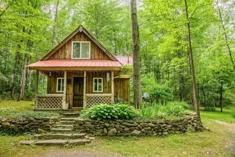 The Whole Family Will Love A Visit To This Adorable, Woodsy Cabin In New York
