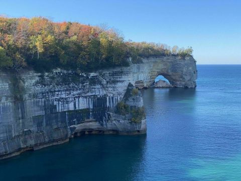Follow This 10-Mile Trail In Michigan To Two Beaches, Two Waterfalls, And A Scenic Cliff