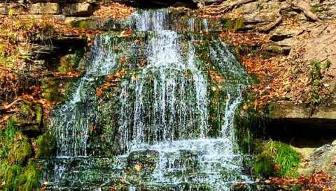 Iowa's Most Easily Accessible Waterfall Is Hiding In Plain Sight At The Spook Cave Campground