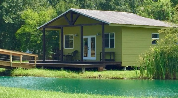 Forget The Resorts, Rent This Charming Waterfront Cottage In Louisiana Instead