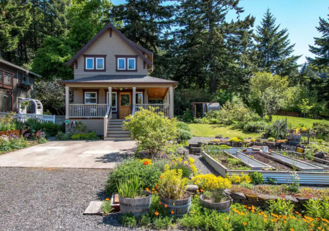 You Can't Help But Feel Relaxed At This Charming Garden House In Oregon With Its Own Cedar Barrel Sauna