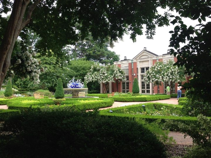 Visitor center of the botanical garden at Mississippi State University with hedges in the foreground