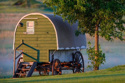 Channel Your Inner Pioneer When You Spend The Night At This Covered Wagon Campground In De Smet, South Dakota
