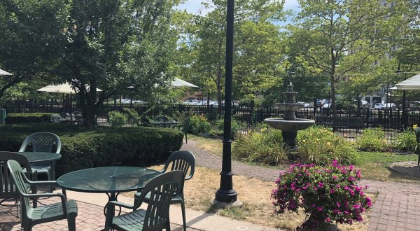 Clara’s On The River In Michigan Has A Gorgeous Patio That Feels Like Dining In A Secret Garden