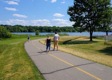 Take A Paved Loop Trail Around This Scenic Michigan Lake For A Peaceful Adventure